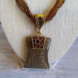 BROWN+, MULTI STRAND BEADED PENDANT NECKLACE