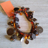 MULTI CHARM,BRONZE, ORANGE BEADS